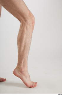 Tony  1 calf flexing nude side view 0004.jpg